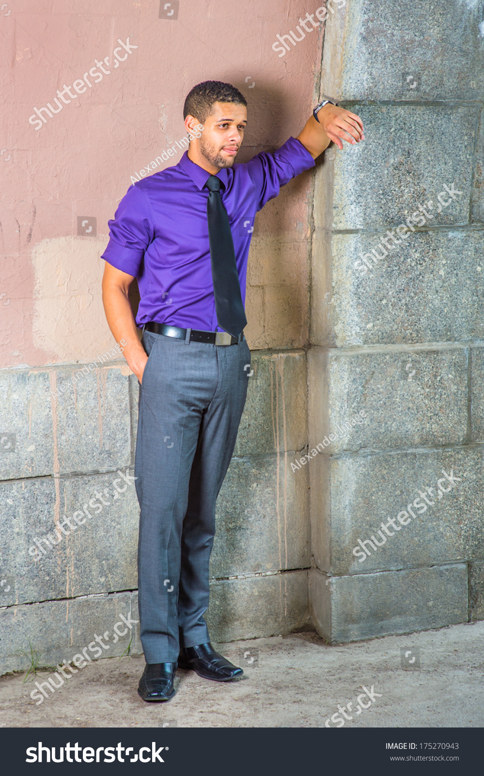 purple shirt and gray pants