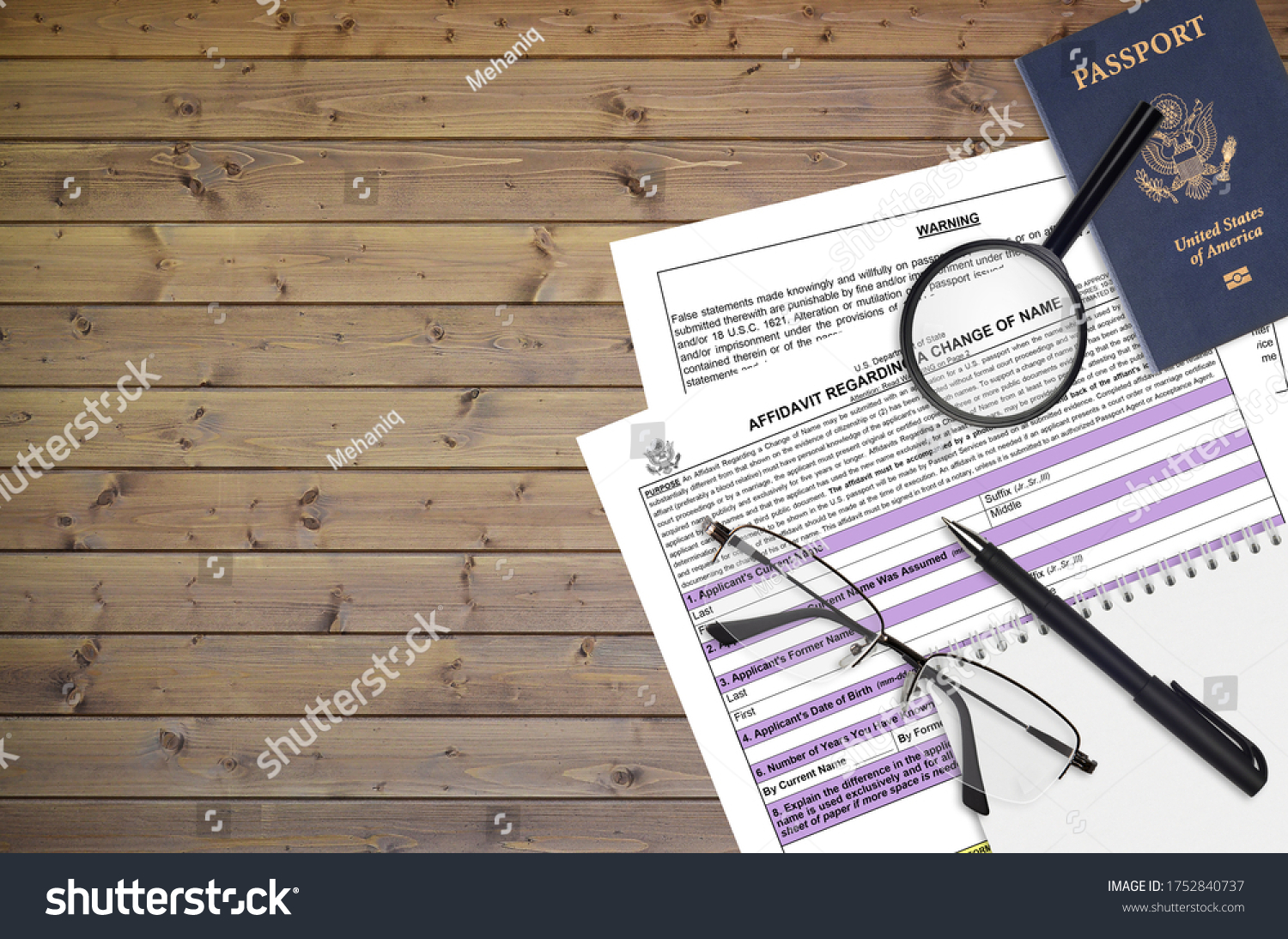 Department of State form DS60 Affidavit Regarding a change of name lies on table and ready to fill. Paperwork during operations with US Passport concept. Flat lay top view #1752840737