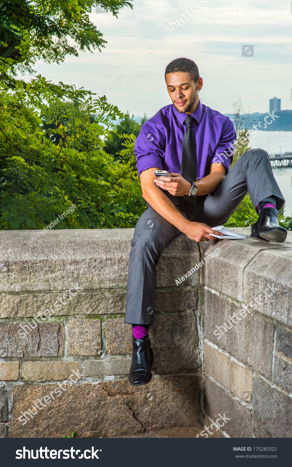 Dressing in a purple shirt, gray pants 