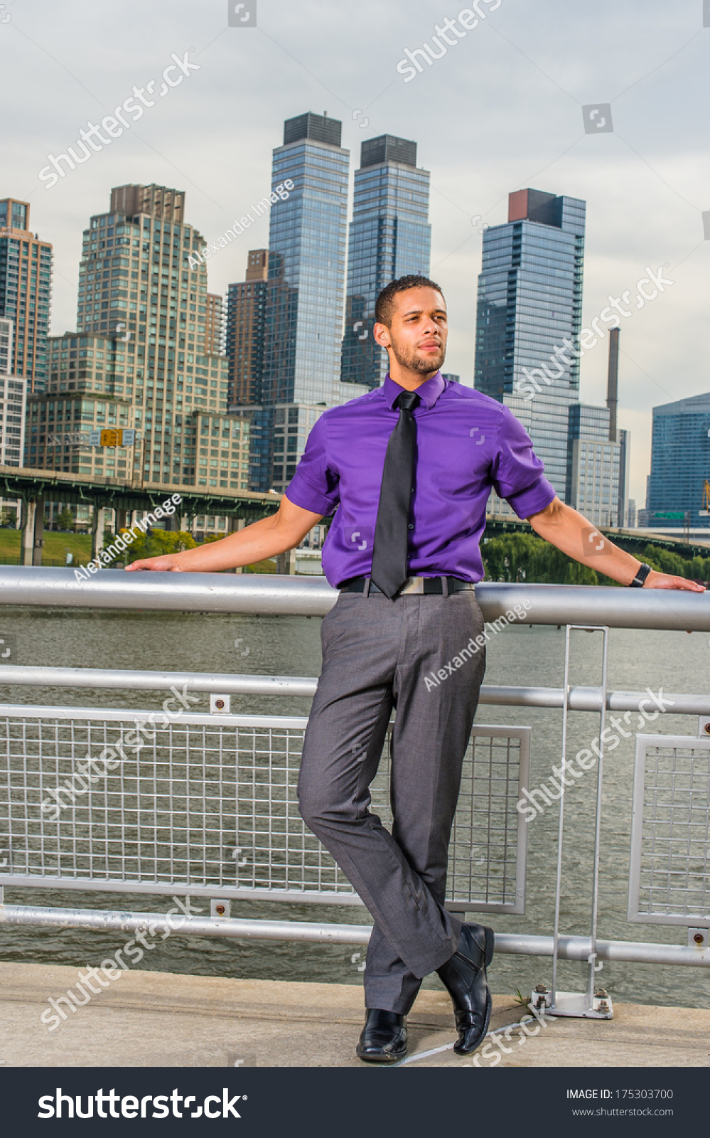 Dressing in a purple shirt, gray pants 