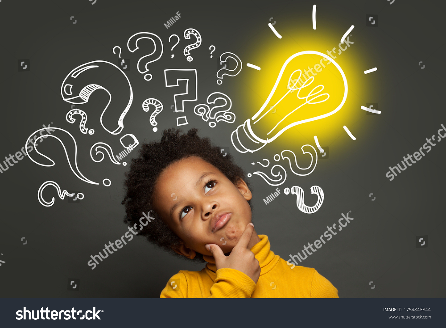Thinking child boy on black background with light bulb and question marks. Brainstorming and idea concept #1754848844