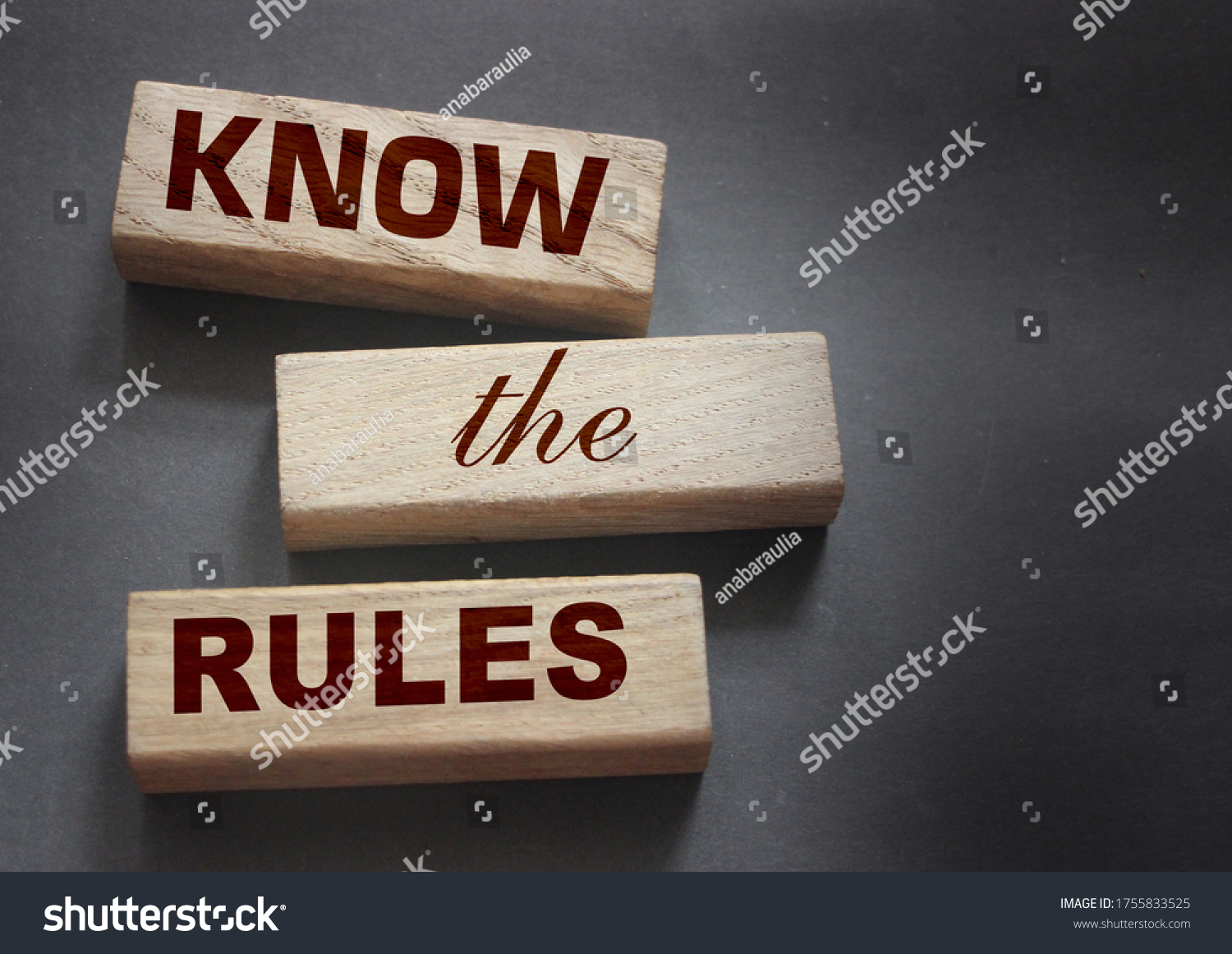 Know the rules word on wooden blocks isolated on dark grey background. business process regulation concept. #1755833525