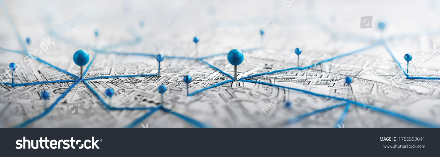 Location marking with a pin on a map with routes. Find your way. Adventure, discovery, navigation, communication, logistics, geography, transport and travel theme concept background. #1756593041