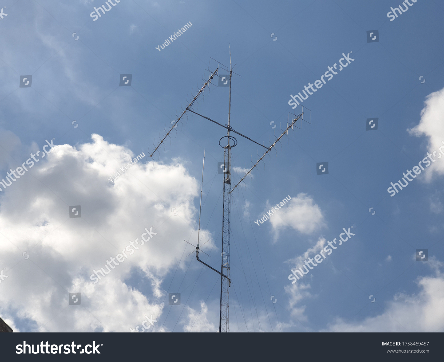 Amateur radio antenna with blue sky background #1758469457