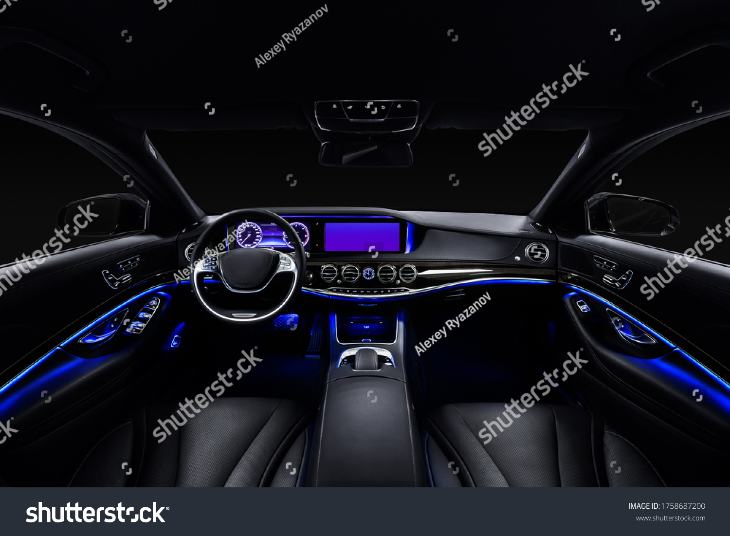 Car interior from driver seat view. Black leather cockpit with blue ambient light. #1758687200