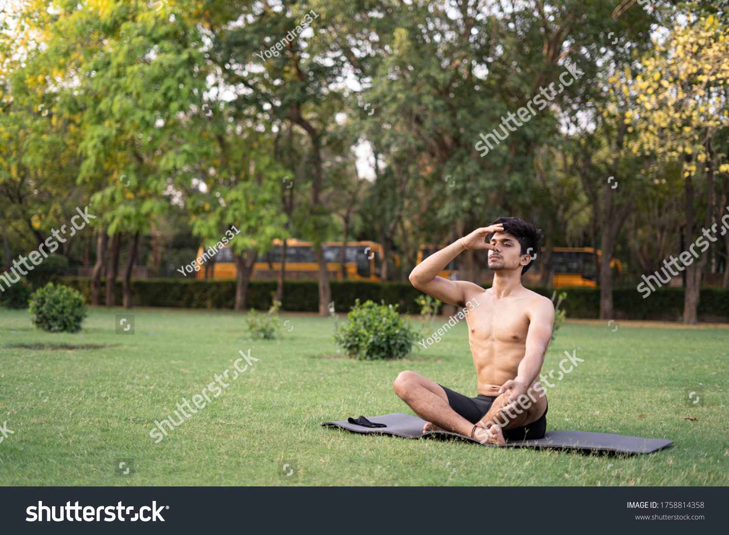 A young indian shredded teenage boy doing yoga - Royalty Free Stock ...