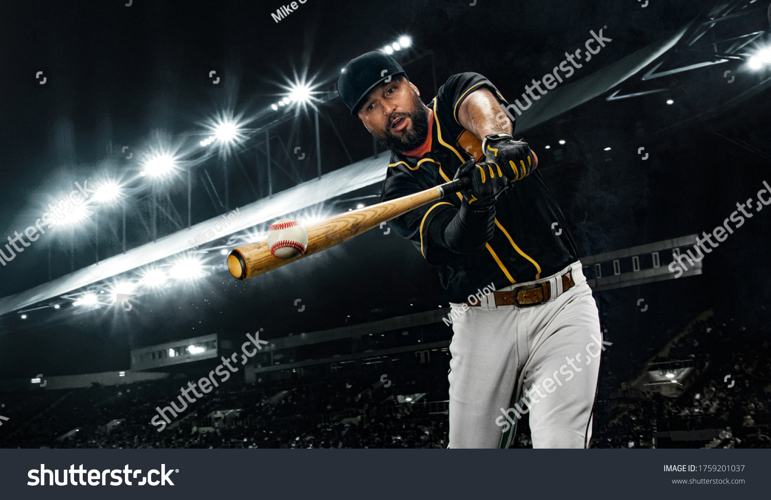 Porfessional baseball player with bat taking a swing on grand arena. Ballplayer on stadium in action. #1759201037