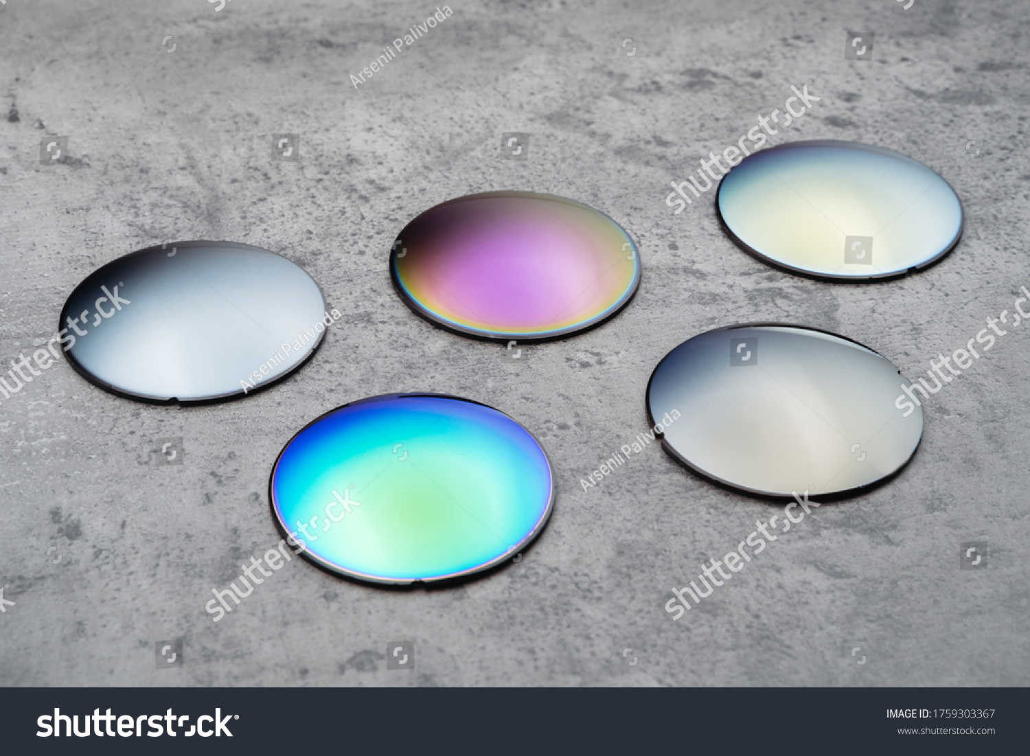 Close up of optical lenses for sunglasses with different color. Production and adjust of new eyeglasses lens in optics. Eyesight concept #1759303367