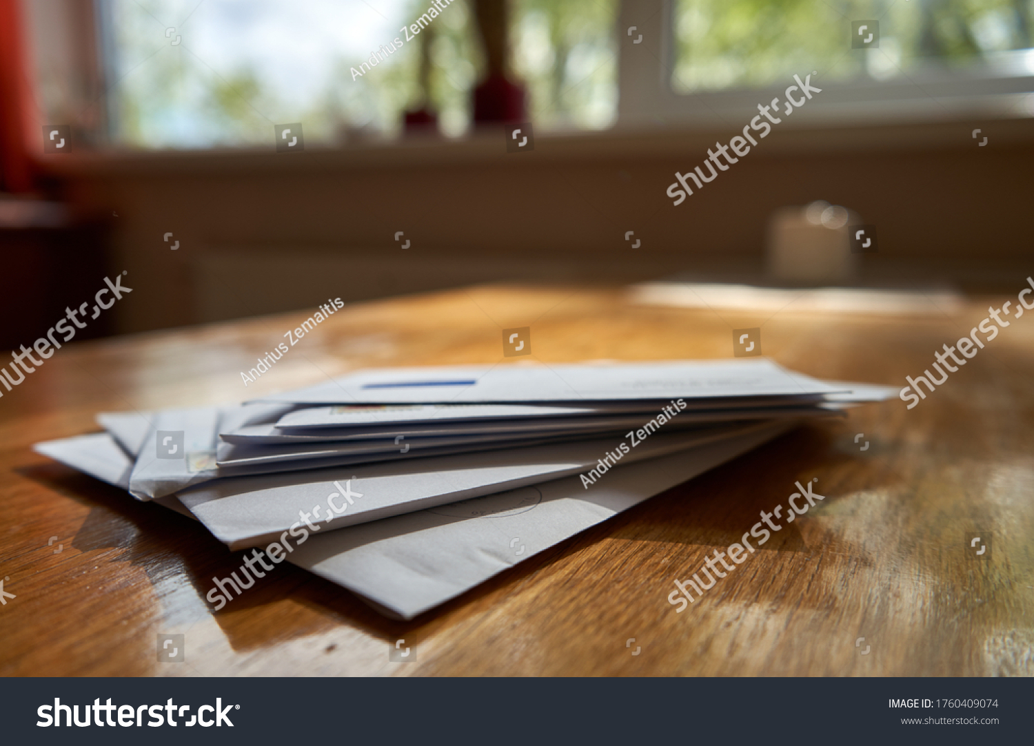 Bunch of envelopes in the kitchen #1760409074