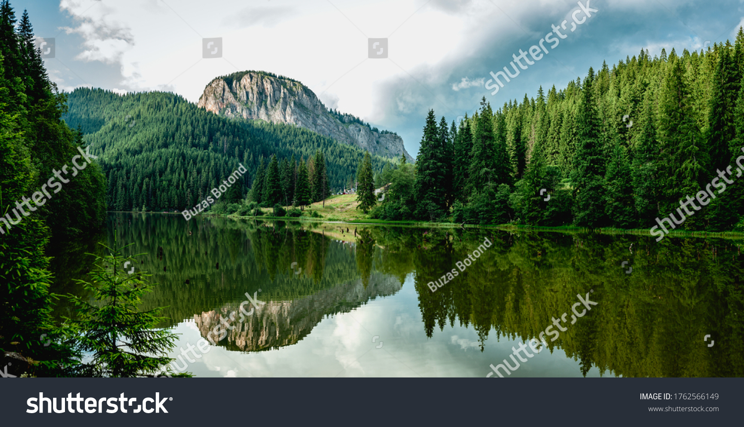 Summer scenery of mountain lake Lacul Rosu (Red Lake or Killer Lake). Popular travel destination and place for active rest and adventures in Eastern Carpathians. Harghita County, Romania #1762566149