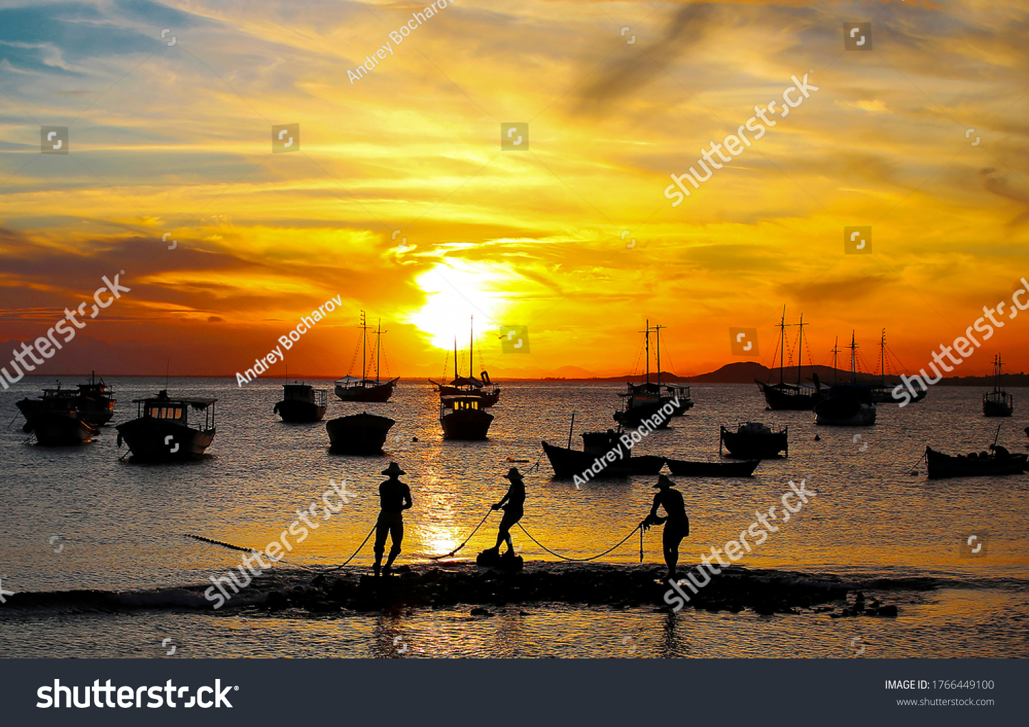 Fisherman fishing at sunset sea #1766449100