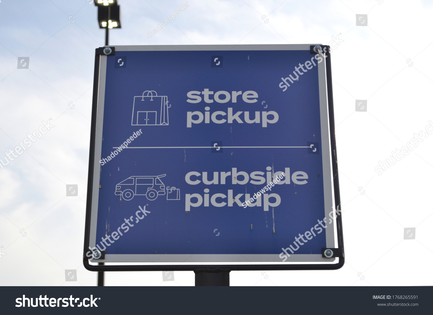 Blue Store Pickup Curbside Pickup Signage Outdoors #1768265591