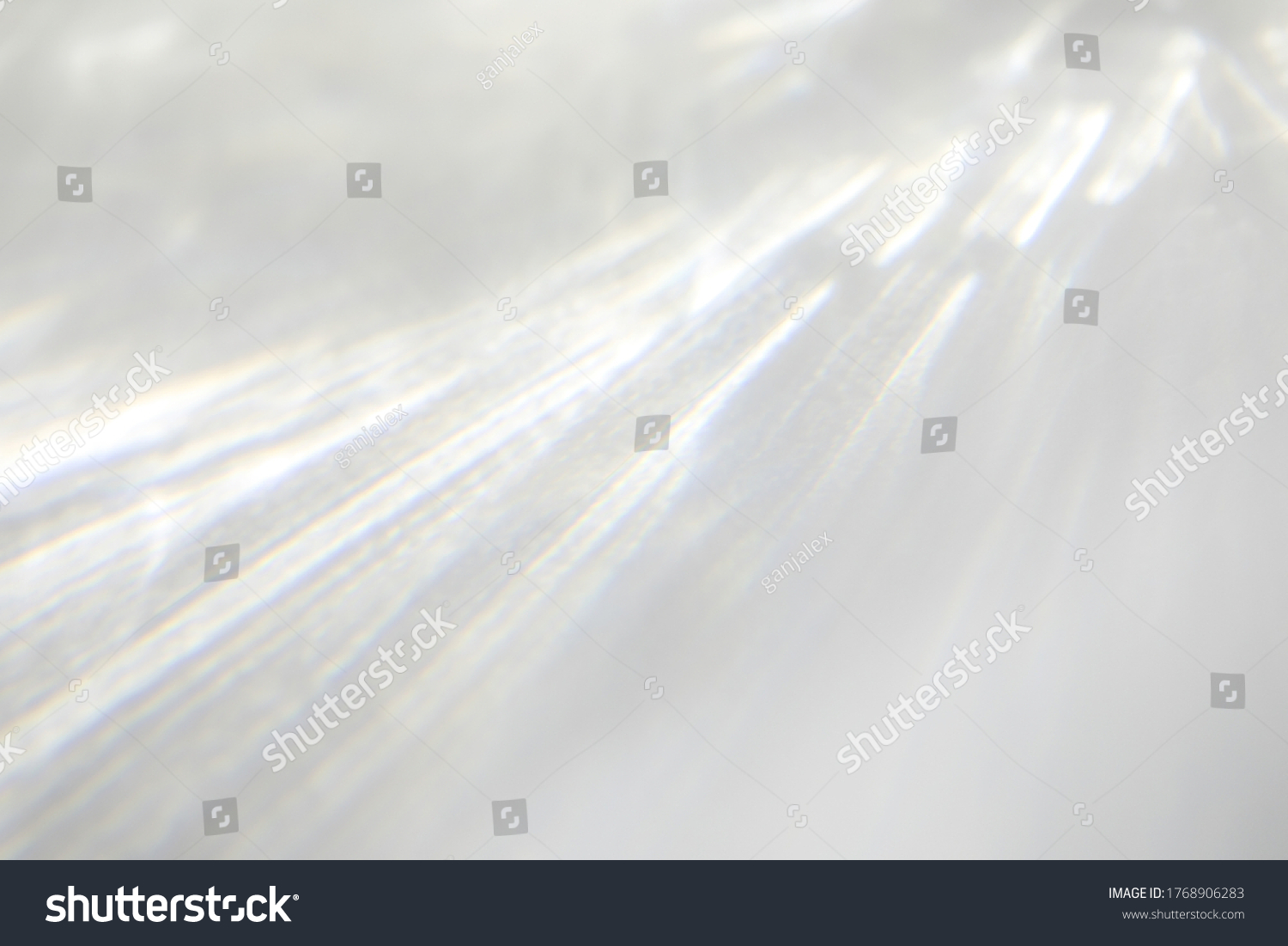 Water texture overlay effect for photo and mockups. Organic drop diagonal shadow and light caustic effect on a white wall. Shadows for natural light effects #1768906283
