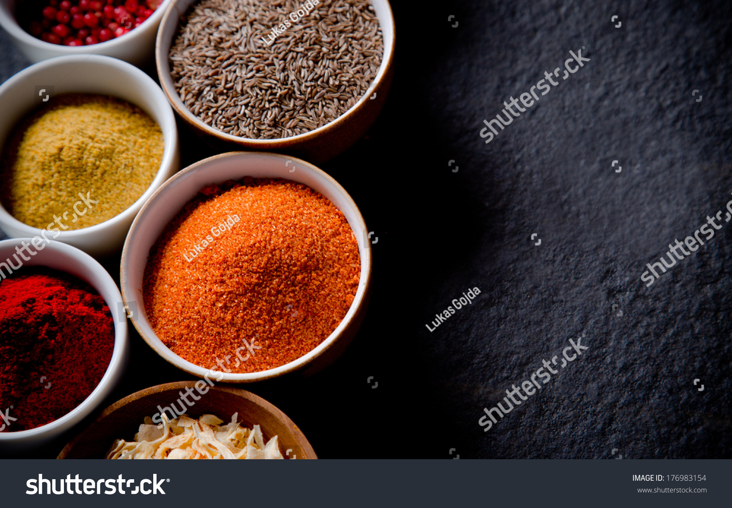 Assorted spices on stone background #176983154