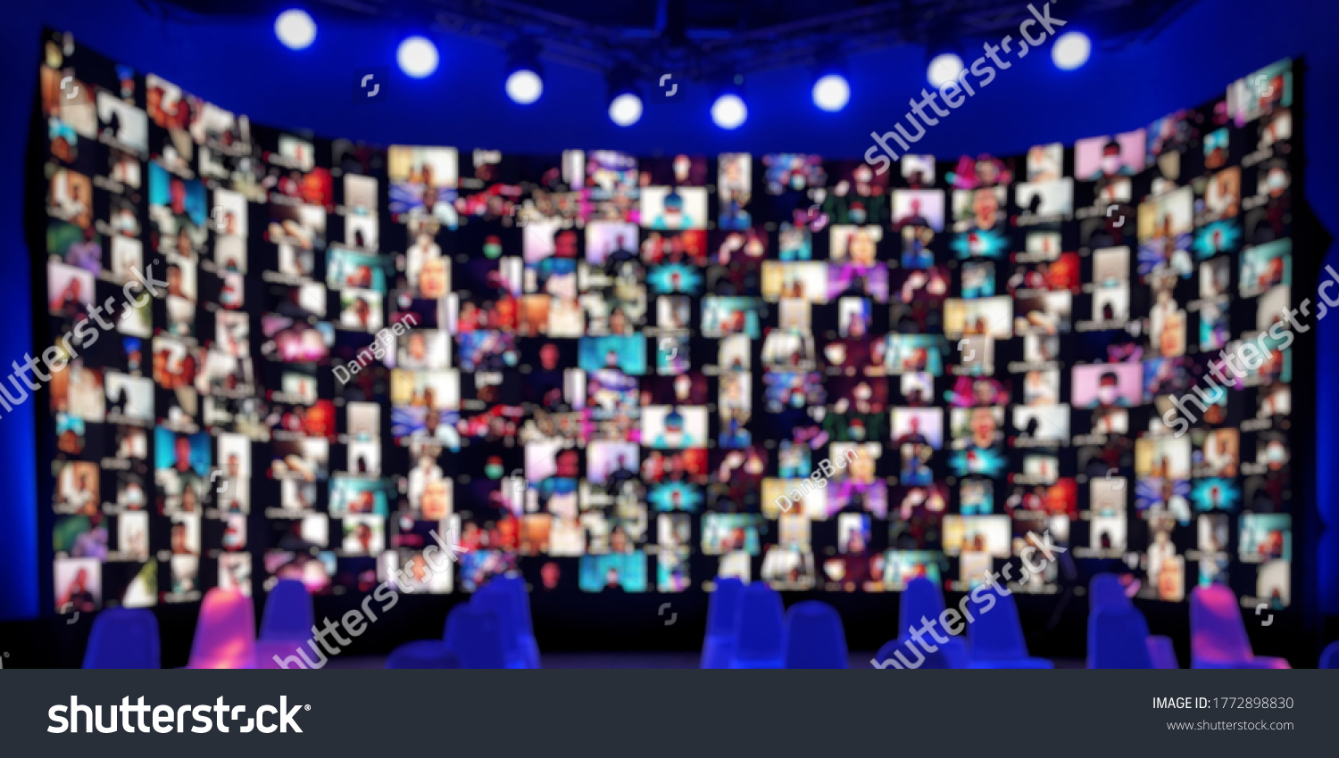 Blur large LED screen show many people's faces join big online event or virtual reality live conference. Big video call seminar, Work from home, Social distancing, New normal event production. #1772898830
