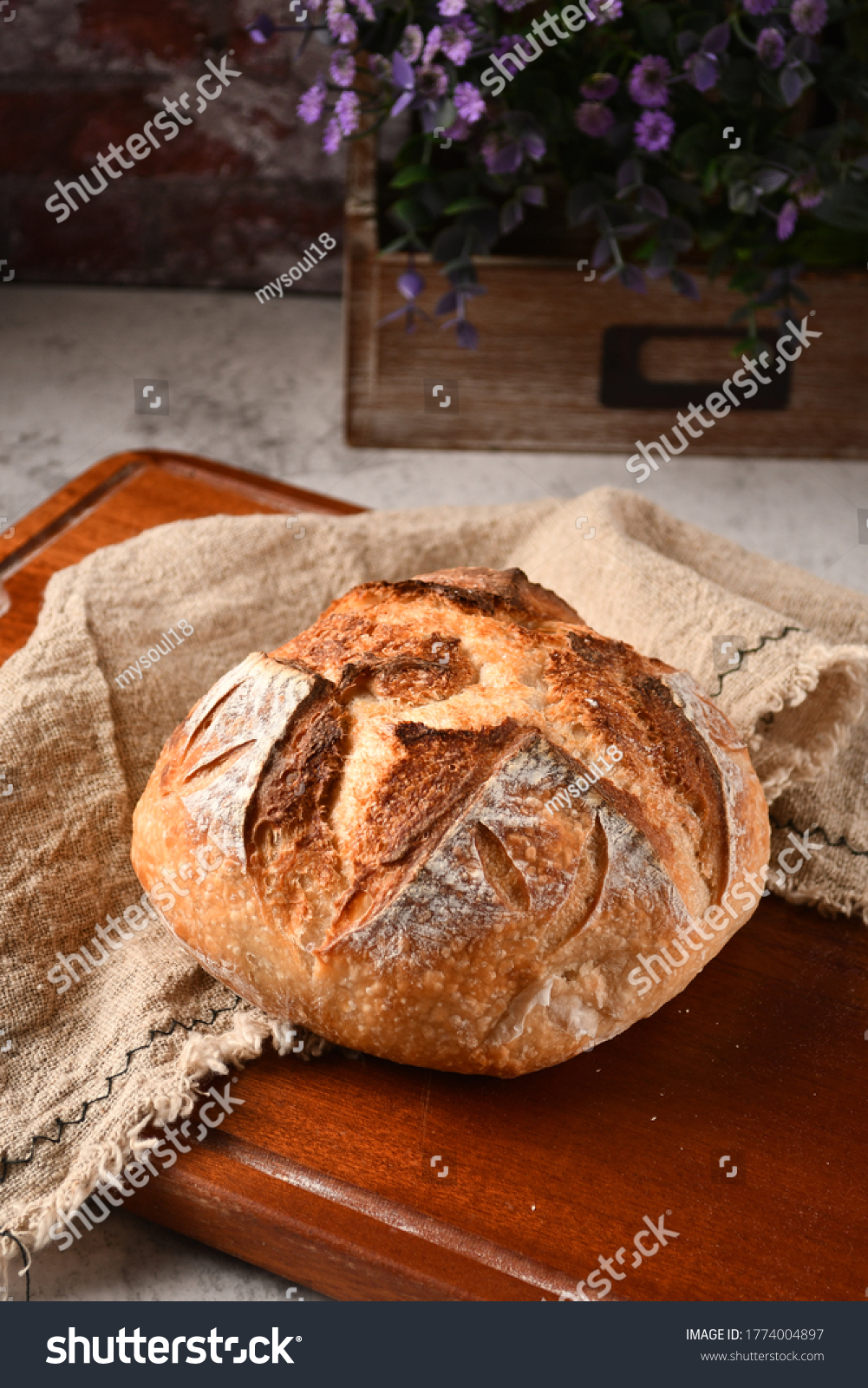 This is a Homemade Sourdough Boule bake by me.  This Boule is a giant round of crusty sourdough and the recipe uses Sourdough starter. It is much like Baguettes. #1774004897