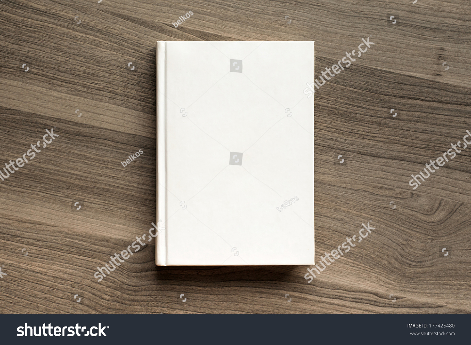 Photo blank book cover on textured wood background #177425480