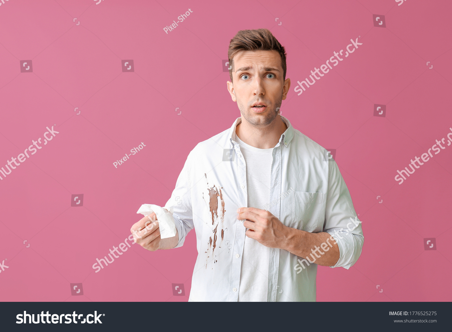 Troubled man in dirty clothes and with napkin on color background #1776525275