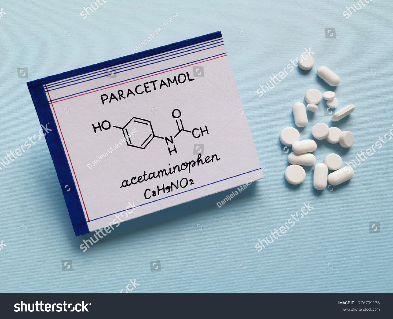 Structural chemical formula of paracetamol molecule with pills and tablets in the background. Paracetamol or acetaminophen is a medication used to treat pain and fever, and it is a mild analgesic. #1776799136