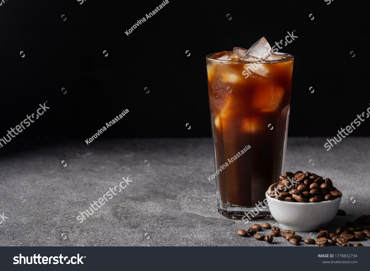 cold iced coffee on a dark background coffee beans, summer drink #1778832734