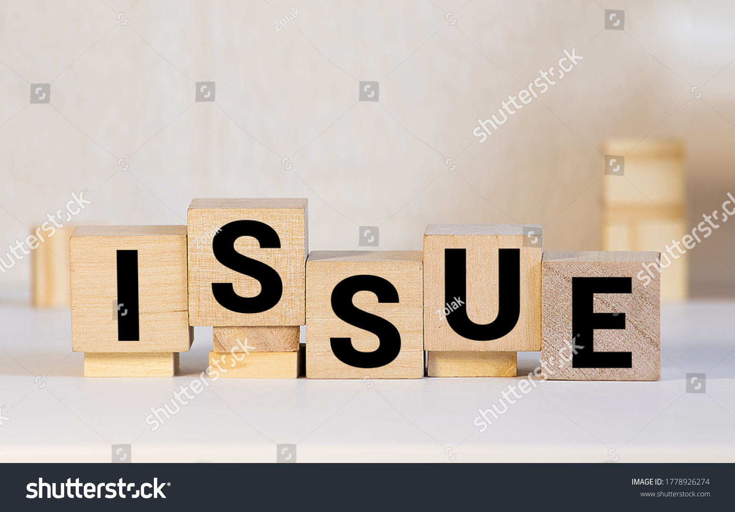 Issue word on wooden cubes. Issue concept #1778926274