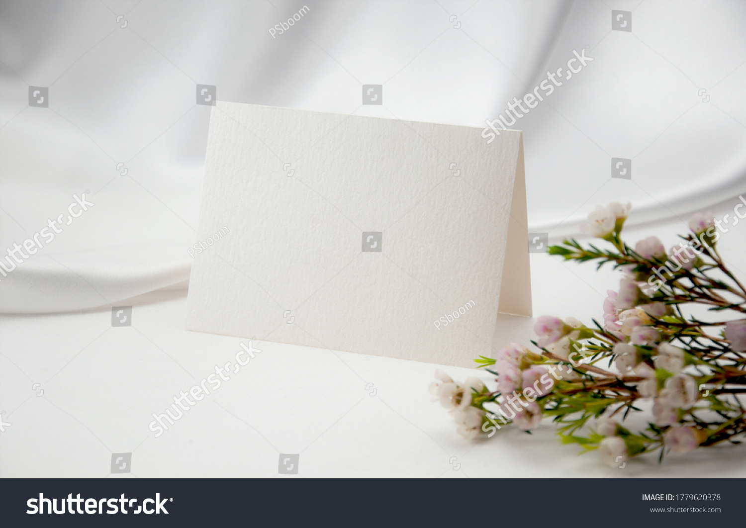 Mockup blank card, for Name place, Folded, greeting, invitation with wax flower on white background. #1779620378
