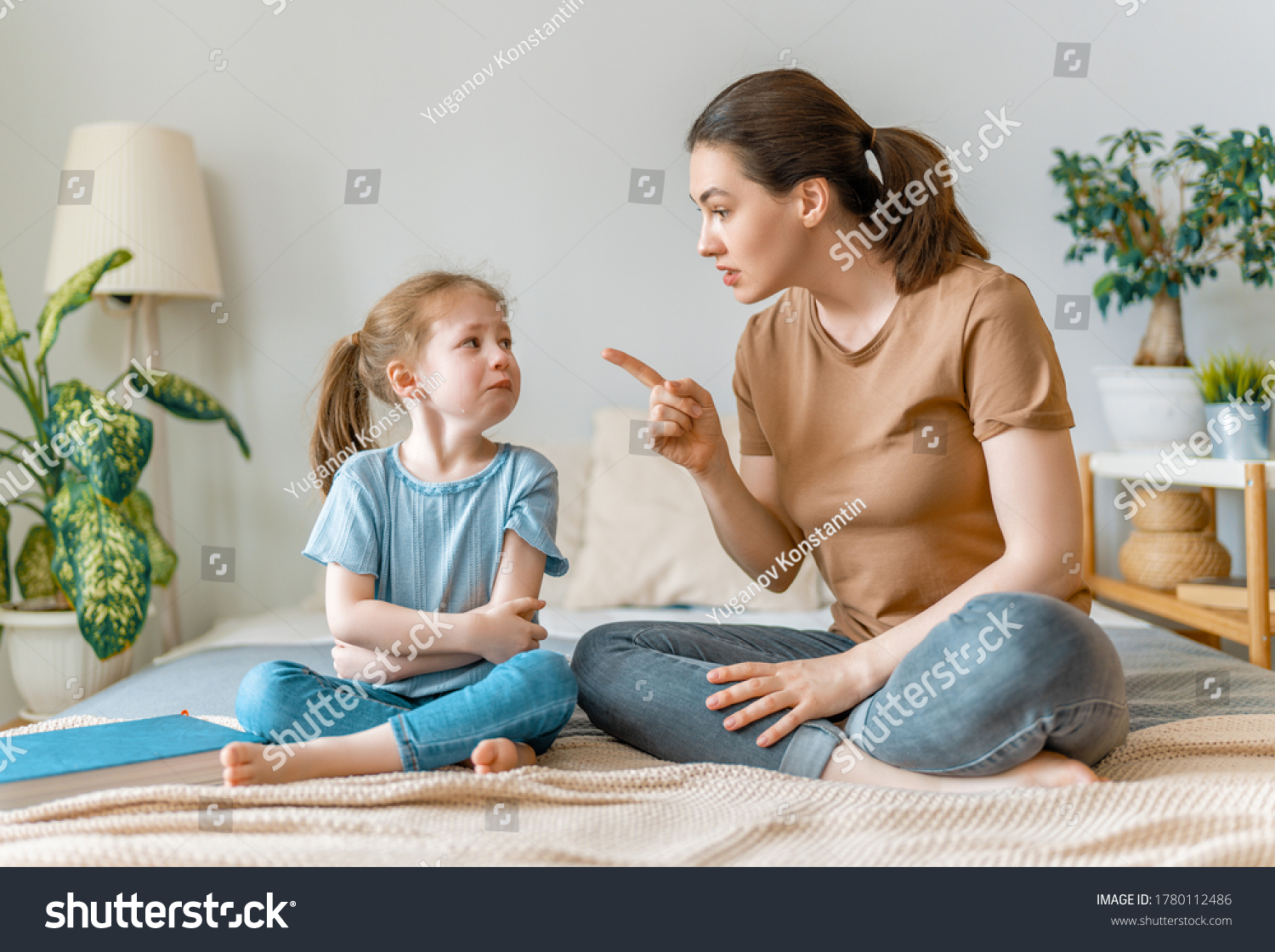 mother is scolding her child girl. family relationships #1780112486