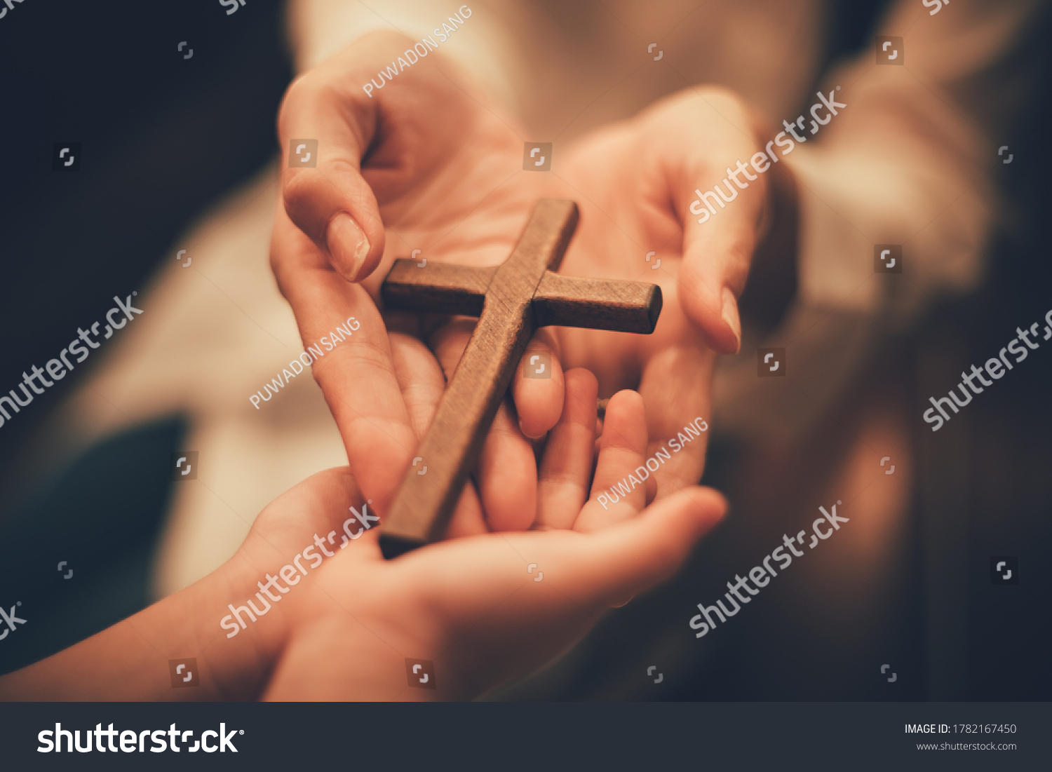 Woman's hand with cross .Concept of hope, faith, christianity, religion, church online. #1782167450