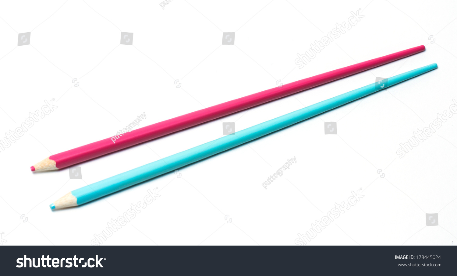 Pink and blue color pencil in shape of chopsticks. Isolated on white background.  #178445024