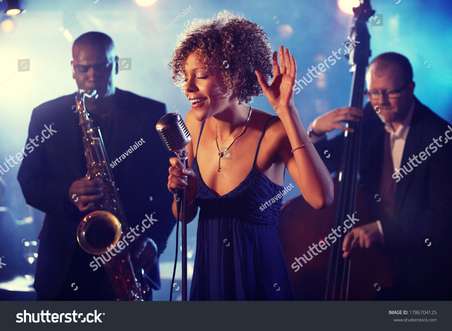 Portrait of Jazz Band playing on Stage #1786704125