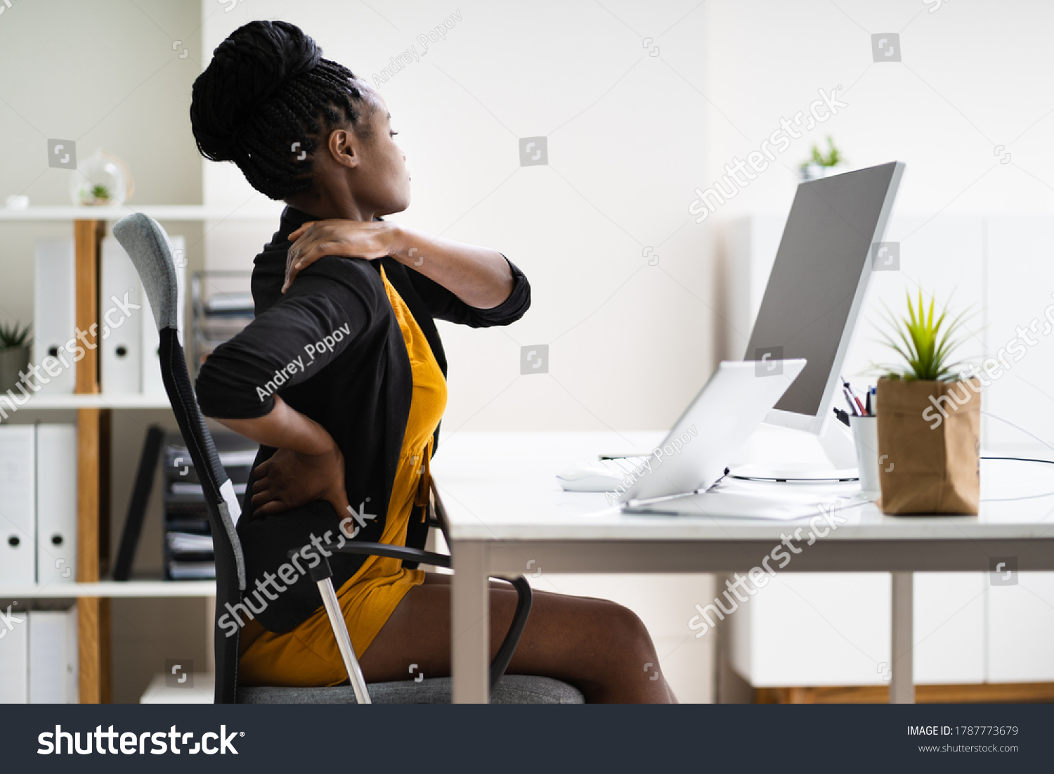 Back Pain Bad Posture Woman Sitting In Office #1787773679