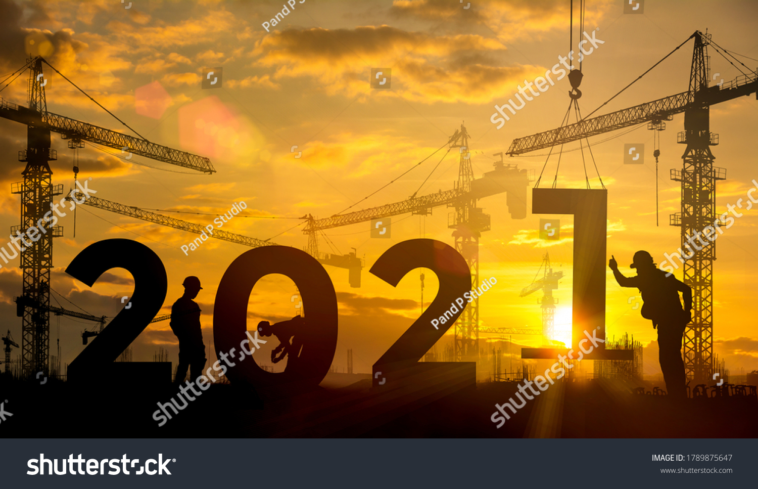 Silhouette construction site,Cranes building construction 2021 year sign #1789875647