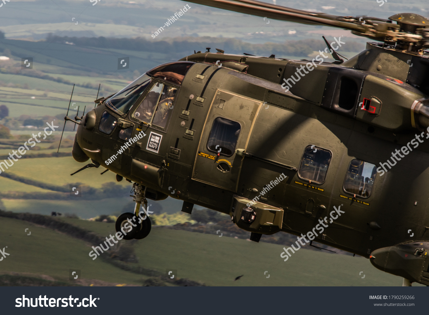 Military Helicopter Merlin EH101 flying on a training mission. #1790259266