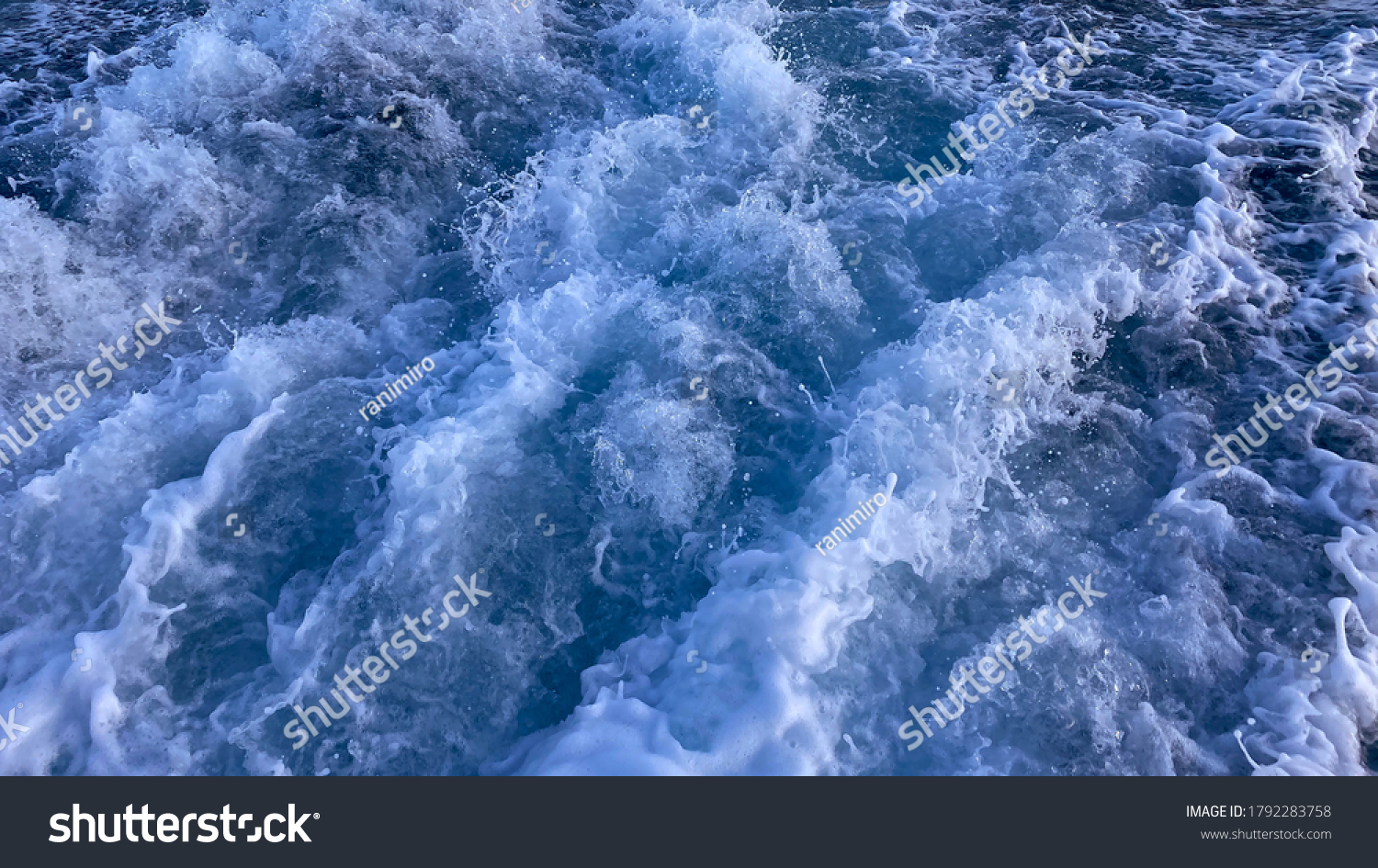 Seawater surface. White foam waves texture as a natural background. #1792283758