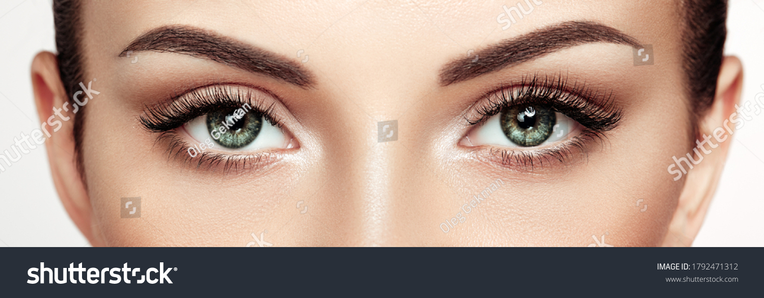 Female Eye with Extreme Long False Eyelashes. Eyelash Extensions. Makeup, Cosmetics, Beauty. Close up, Macro #1792471312