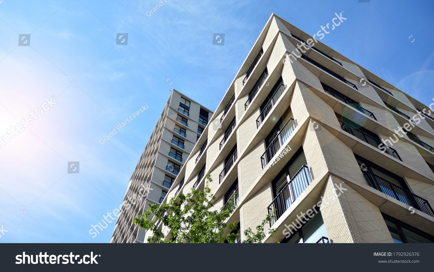 New housing landscape. Facade of a new multi-story residential building. #1792926376