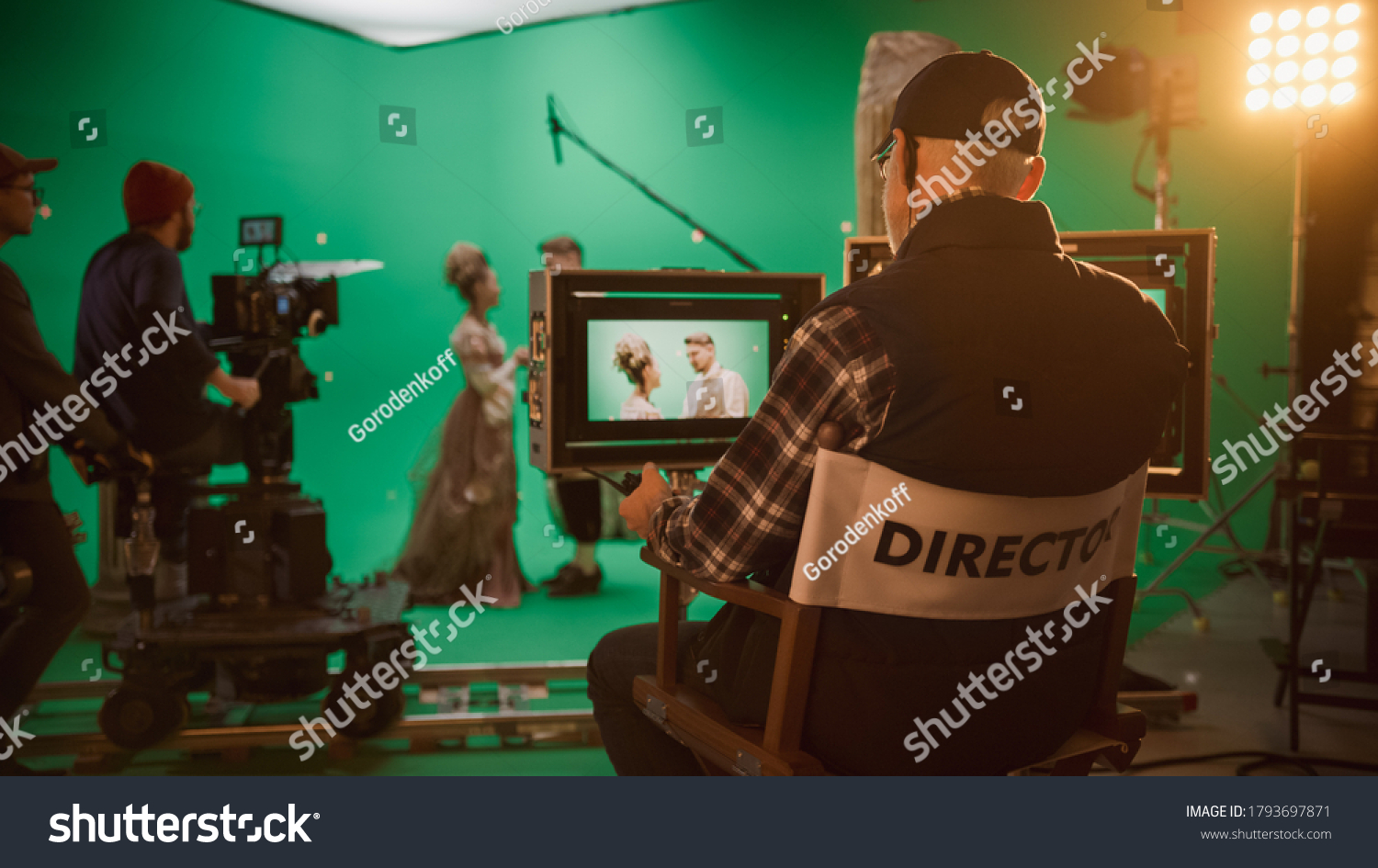 Director Shooting Period Film Green Screen CGI Scene with Actors Wearing Renaissance Costumes. Big Film Studio Professional Crew Shooting Big Budget Movie. Back View Shot #1793697871
