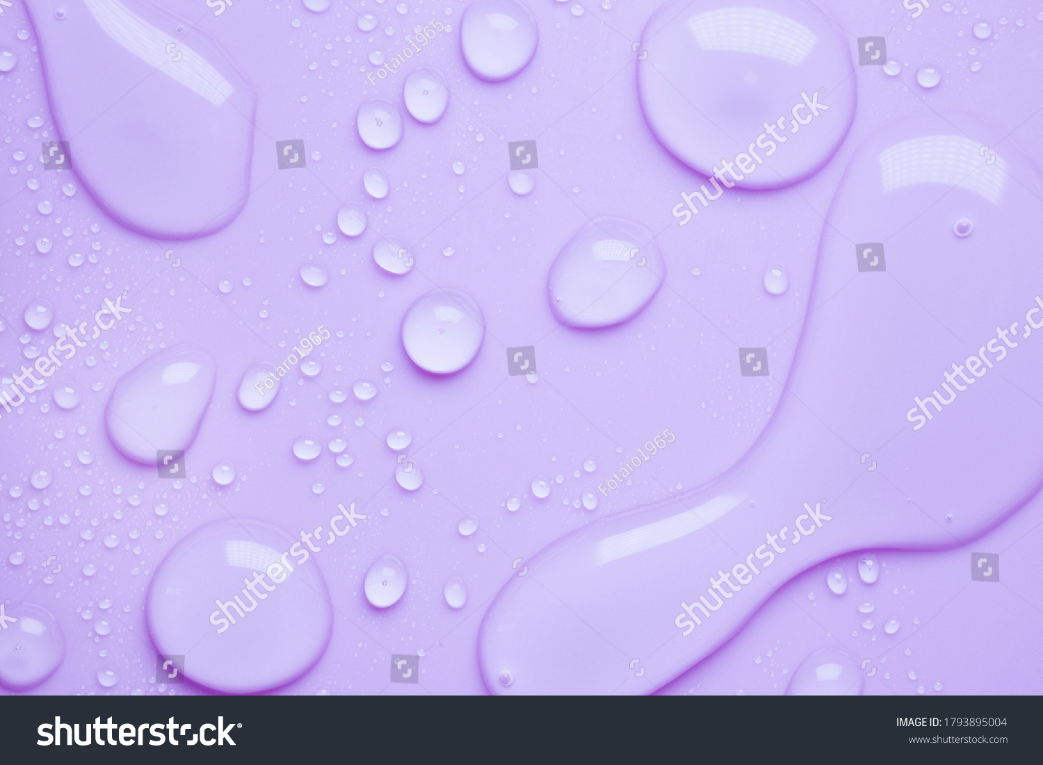 Cosmetic moisturizing liquid drops on purple lavender pastel background. Toner or lotion. Hyaluronic serum #1793895004