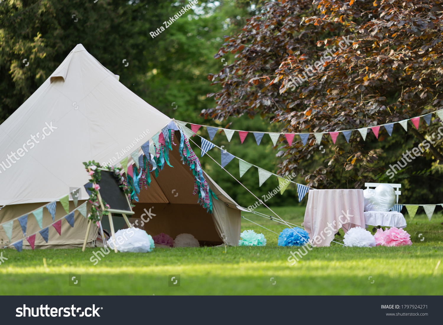 Canvas cotton Bell tent in the yard decorated for summer kids party #1797924271