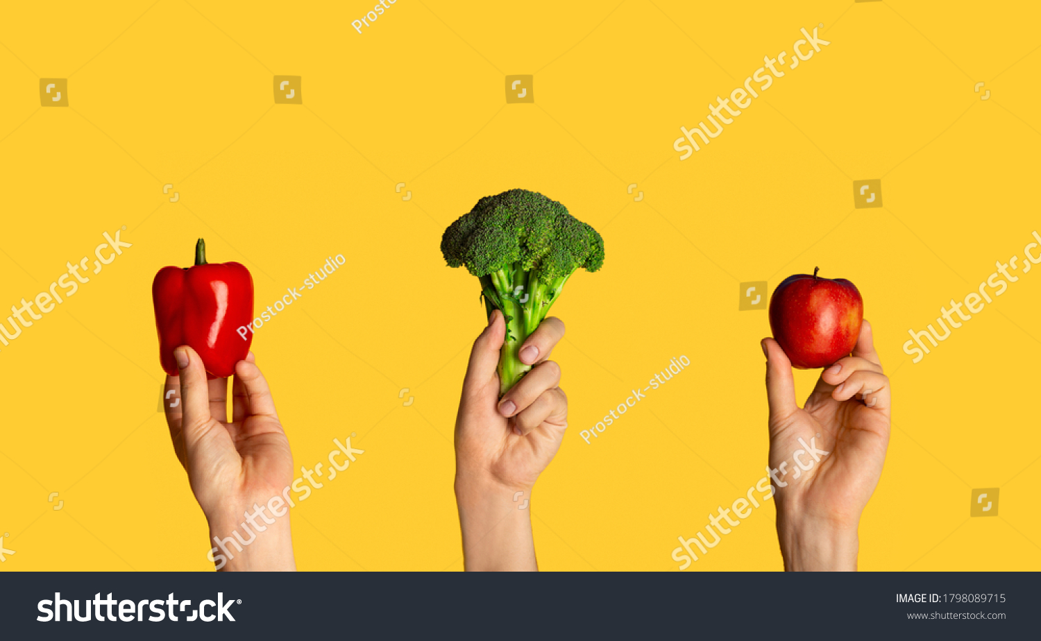 Collage with male hands holding broccoli, bell pepper and apple on orange background, close up. Panorama #1798089715