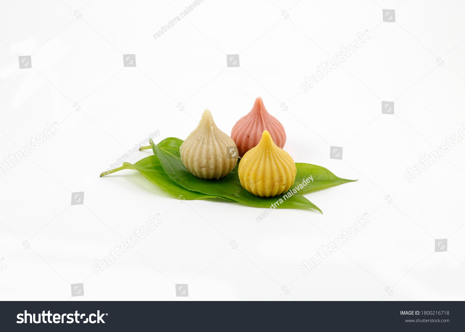 Modak made from khoa is an Indian sweet dumpling offered to Lord Ganapati on Ganesh Chaturthi Festival. variation of modak is prepared Served in a plate. Selective focus #1800216718