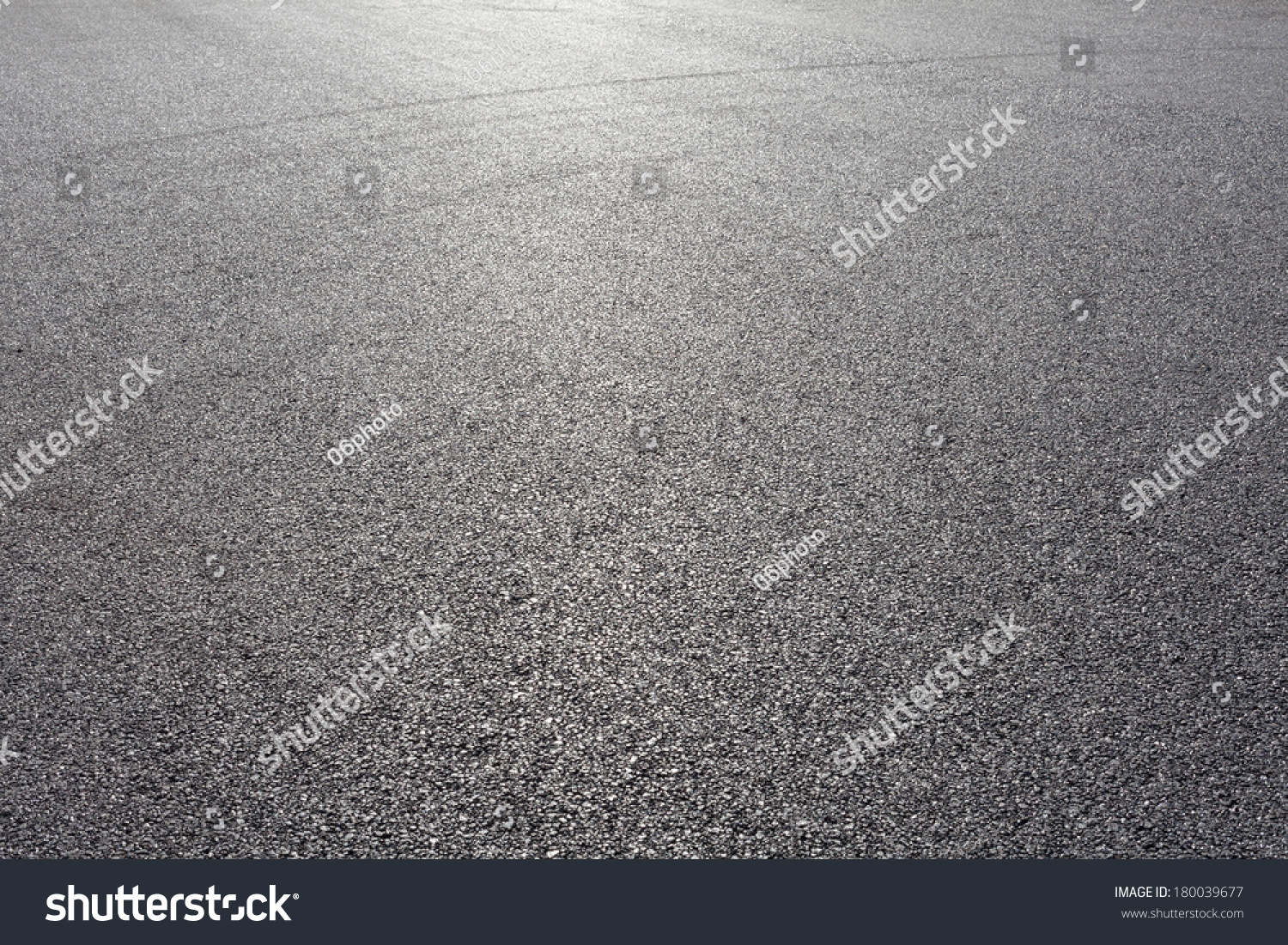 close-up horizontal view of new asphalt road #180039677