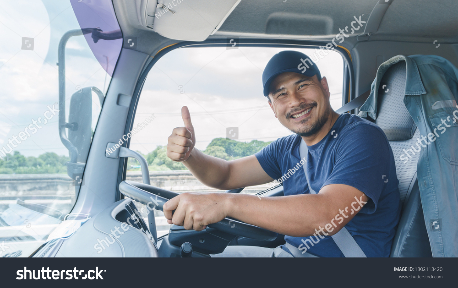 Smile Confidence Young Man Professional Truck Driver In Business Long transport #1802113420