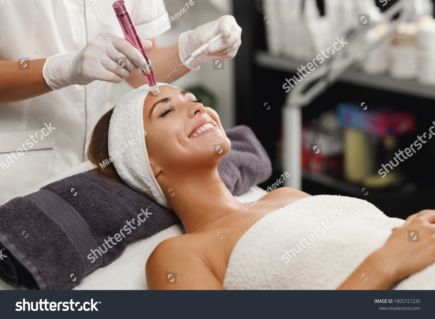 Shot of a beautiful young woman on a facial dermapen micro-needling treatment at the beauty salon. #1805721235