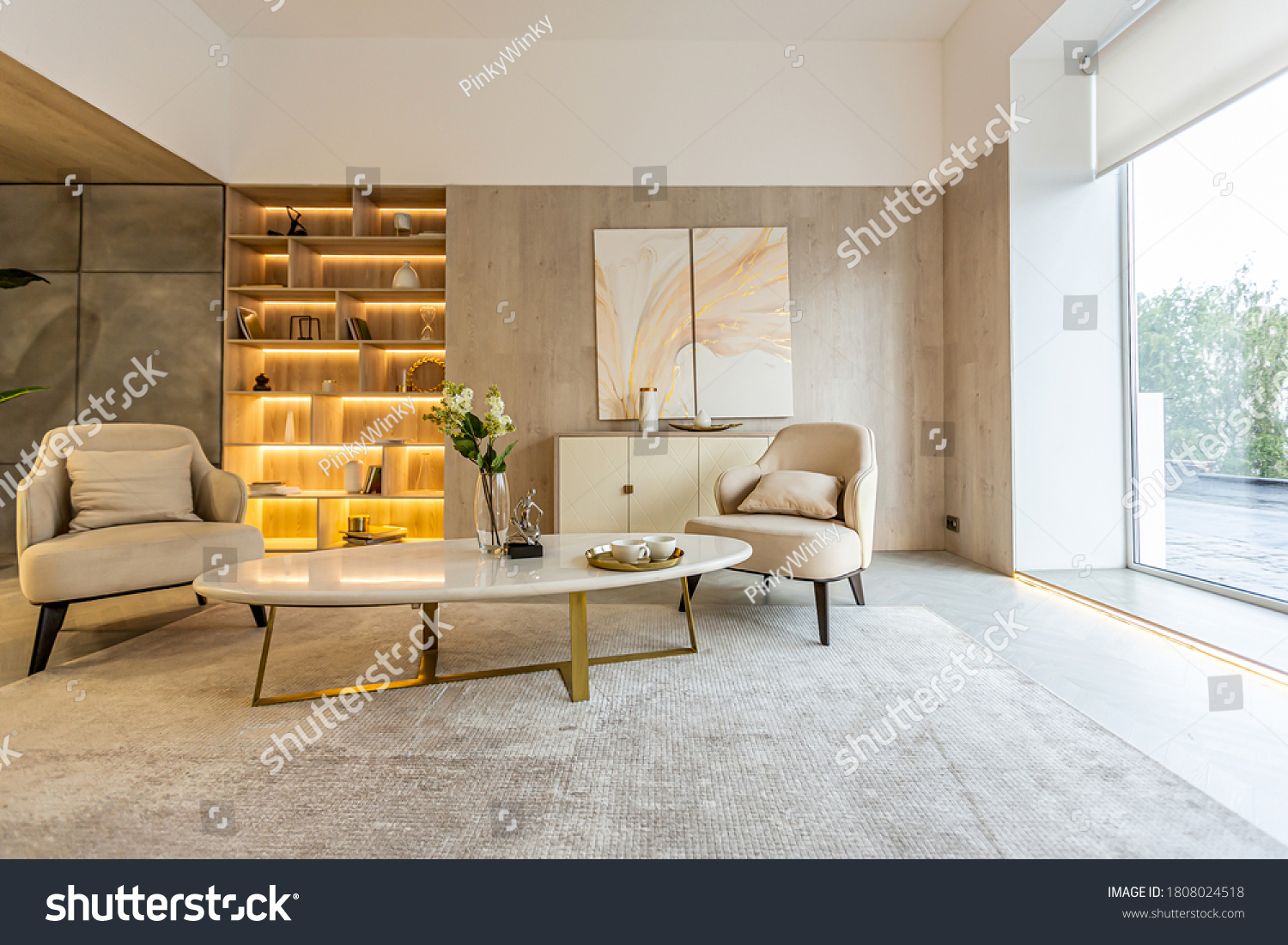 modern interior design of the living area in the studio apartment in warm soft colors. decorative built-in lighting and soft beige furniture #1808024518