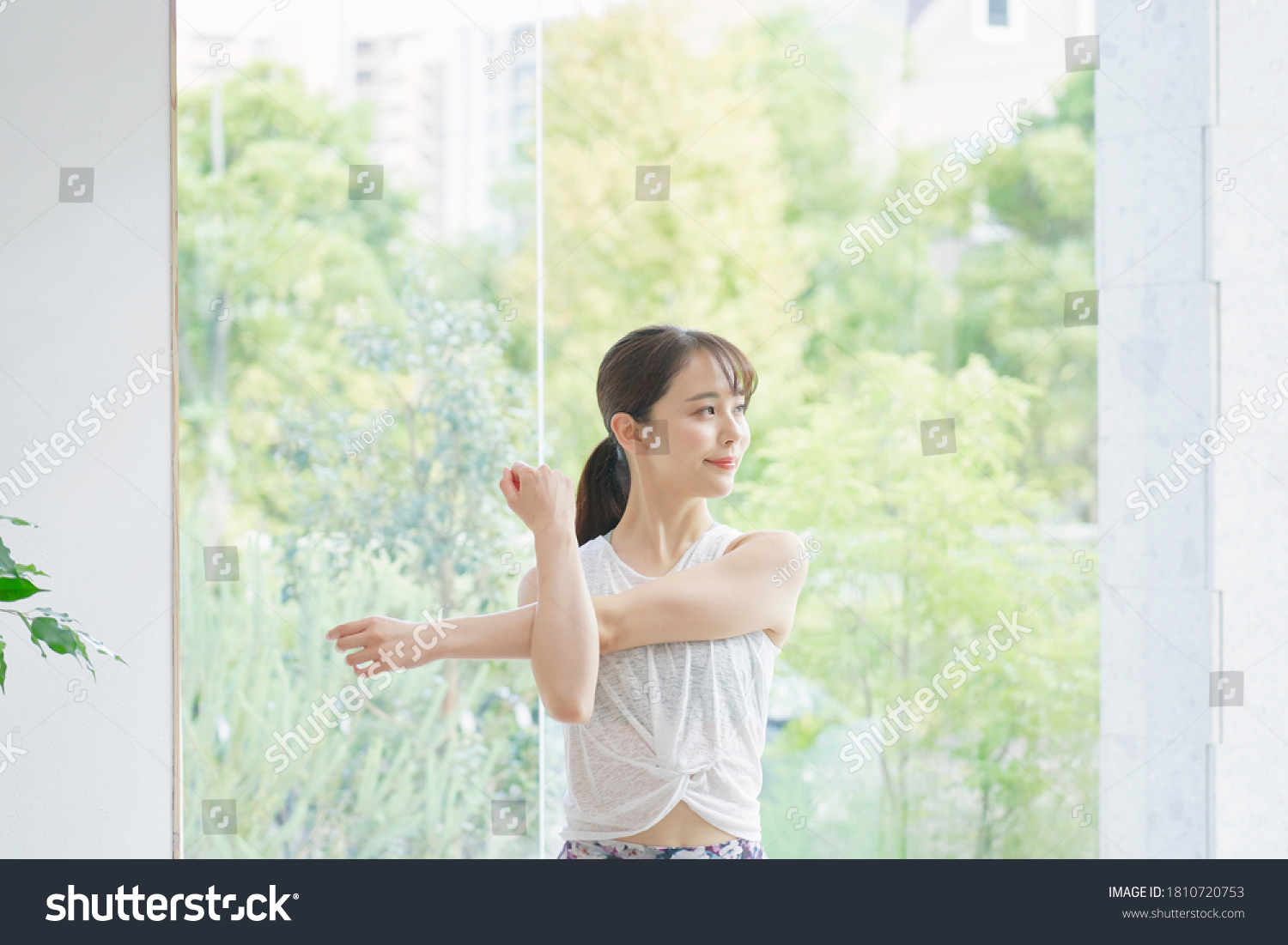 Asian woman exercising at home #1810720753