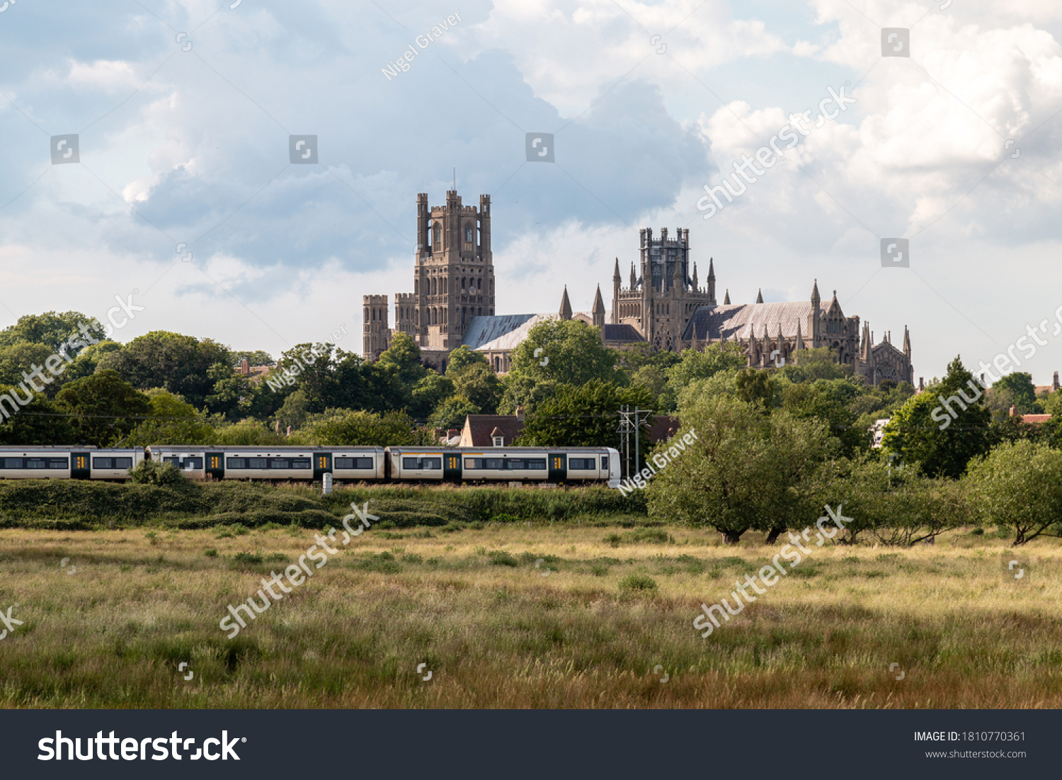 Ely Cathedral with train in foreground #1810770361