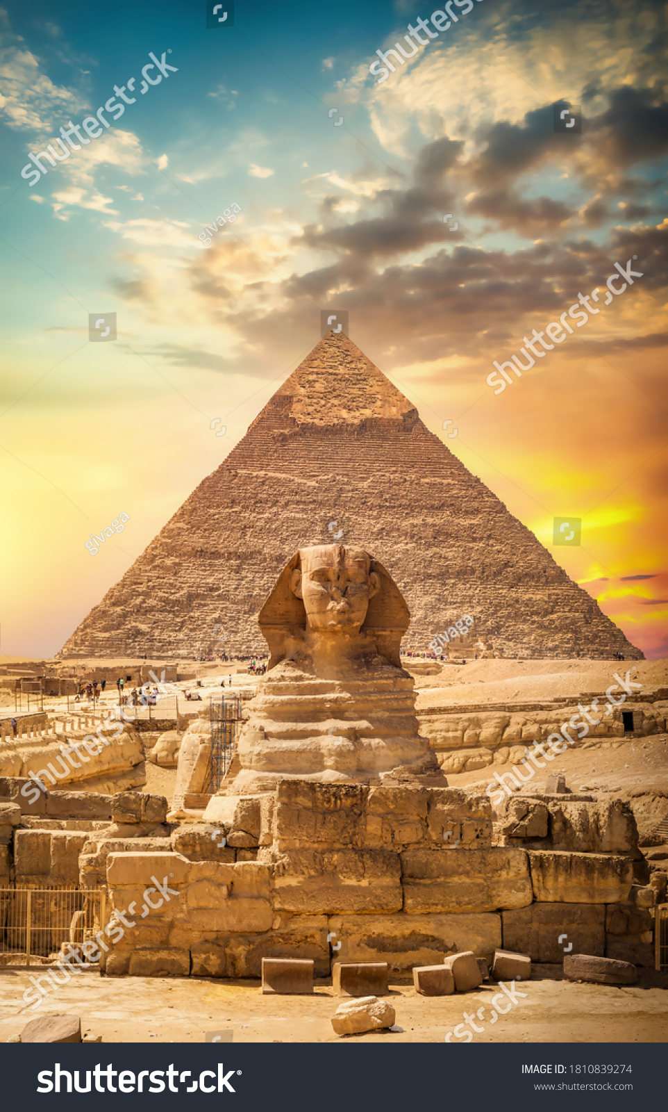 Great sphinx and pyramid under bright sun #1810839274