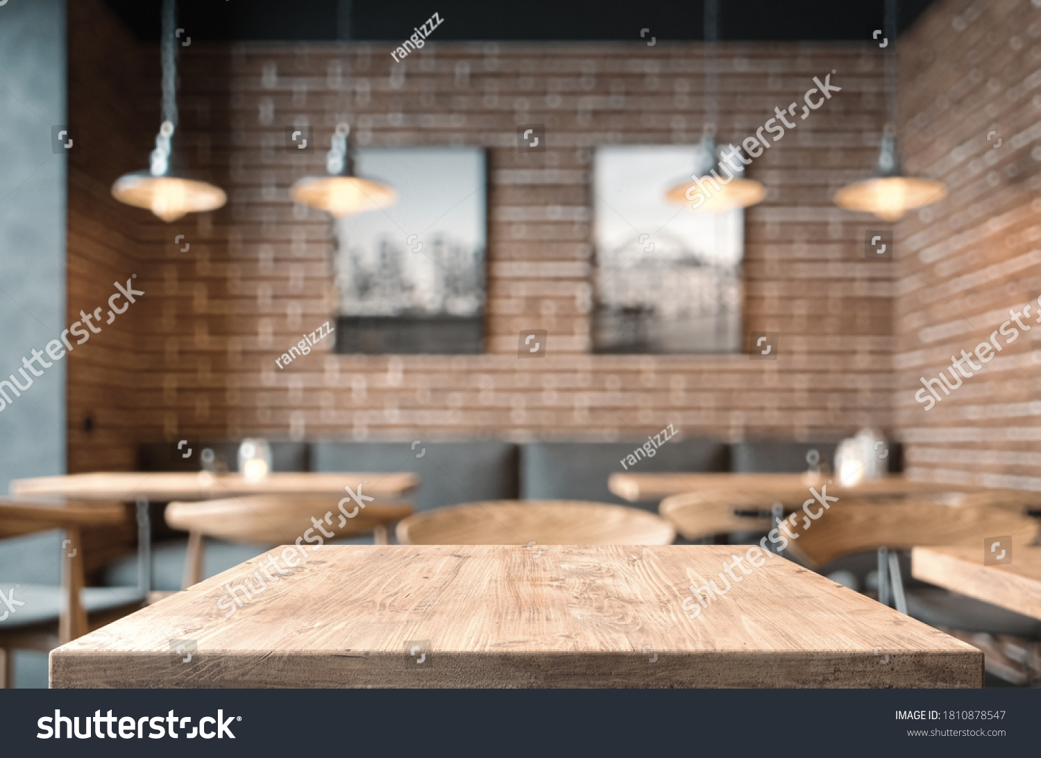 Empty coffee table over defocused coffee shop background with copy space #1810878547