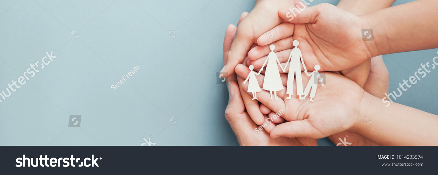 hands holding paper family cutout, family home, foster care, world mental health day, Autism support,homeschooling, budgeting cost of living, inflation concept #1814233574
